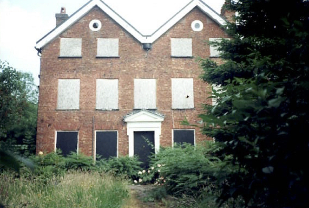 An Artful Gardener Astley Old Vicarage front view - doors and windows boarded up circa 1992