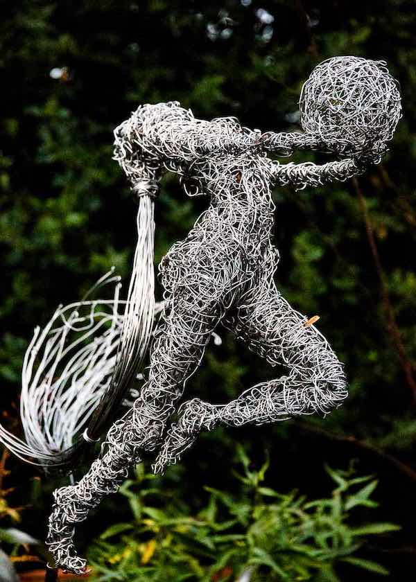An Artful Gardener Wire Figure Gymnast with ball side portrait