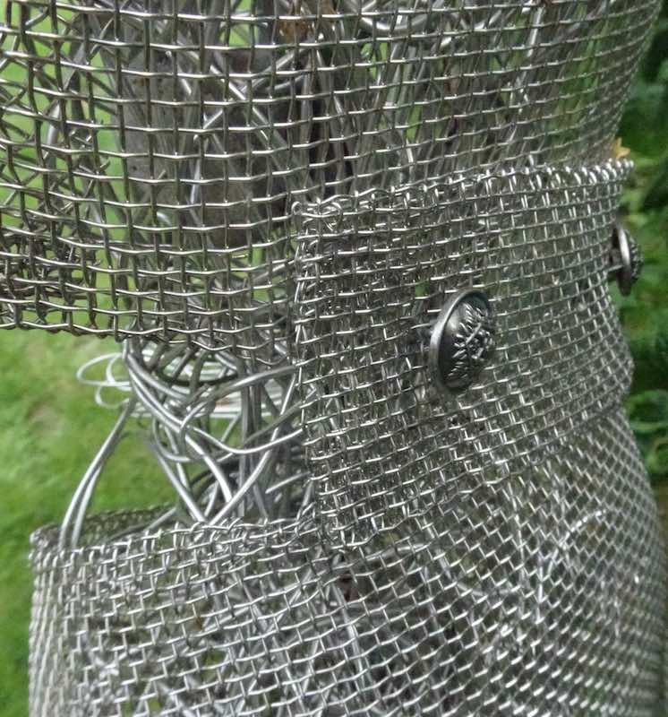 An Artful Gardener Garden Art Wire Figures Flute Player Coat back and buttons