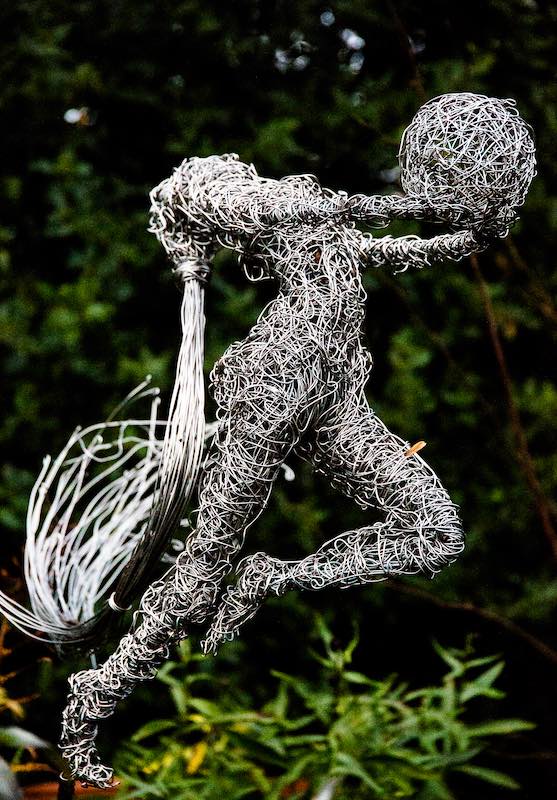 An Artful Gardener Garden Art Wire Figures Gymnast with Ball side profile